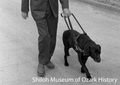 Dr. George V. Harris with his guide dog “Ginny,” Fayetteville, Arkansas, March 28, 1979.
