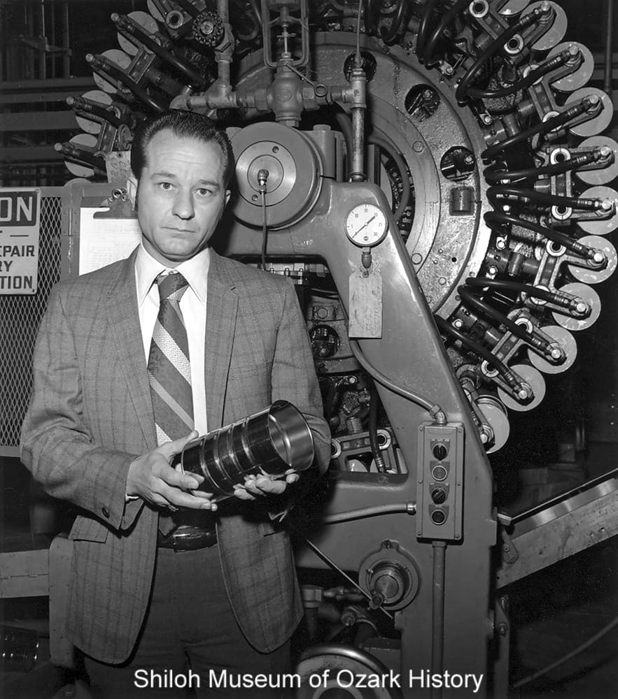 Harold Barron holding a finished can at Heekin Can Company, Springdale, Arkansas, January 1972. 