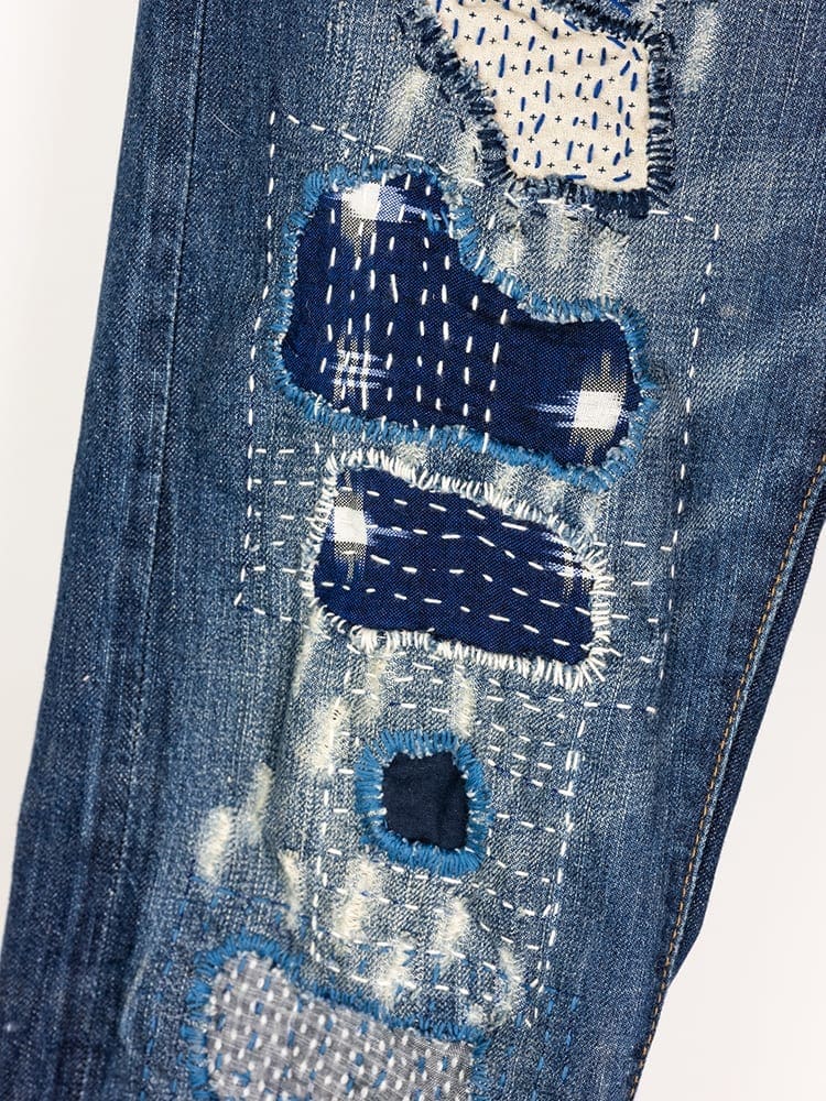 Close-up of shasiko stiching on jeans.