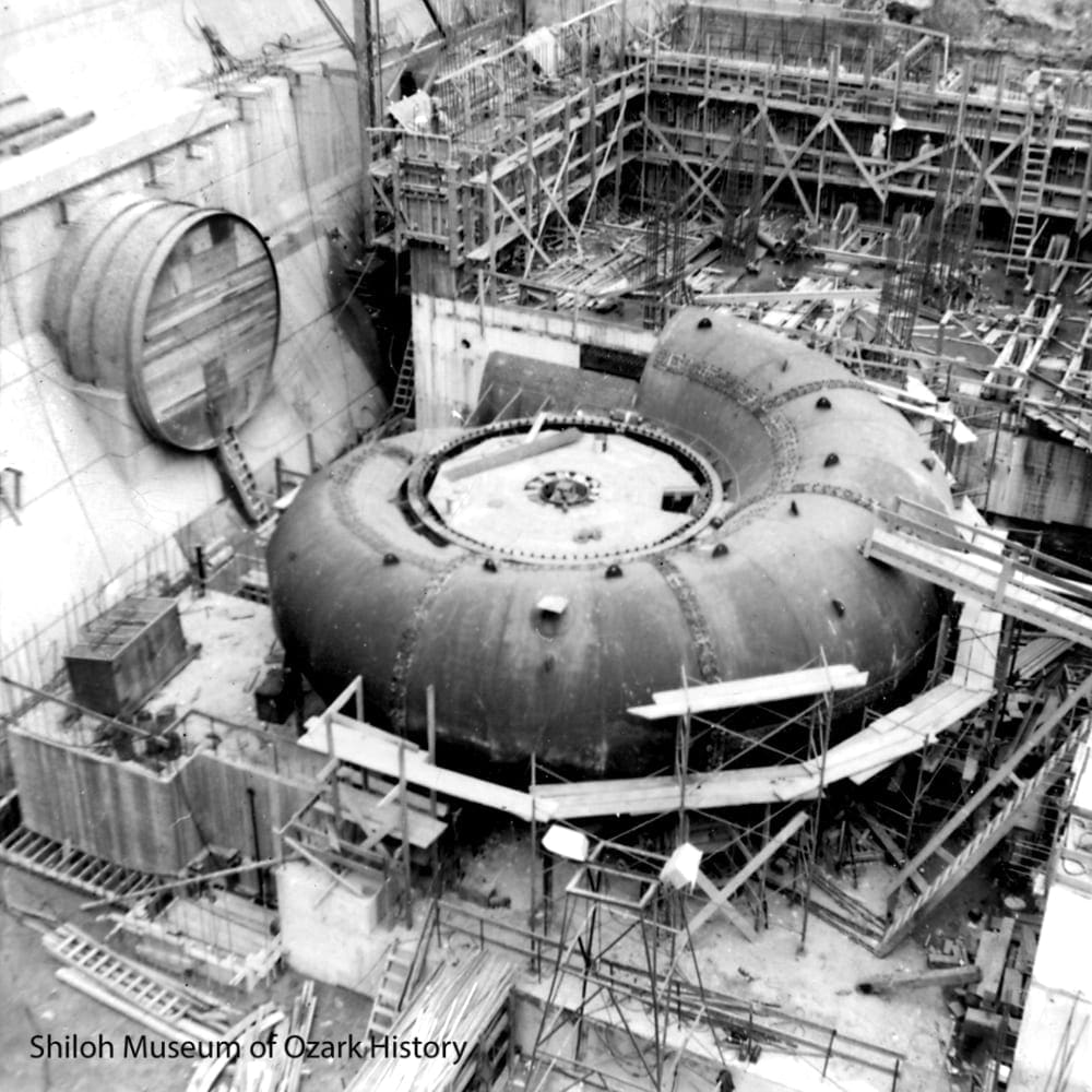 A scroll case under construction, before its connection to the penstock, Summer 1964. 