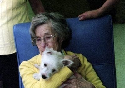 Dale Evans with pet therapy dogs at her nursing home, Fayetteville, 1990.