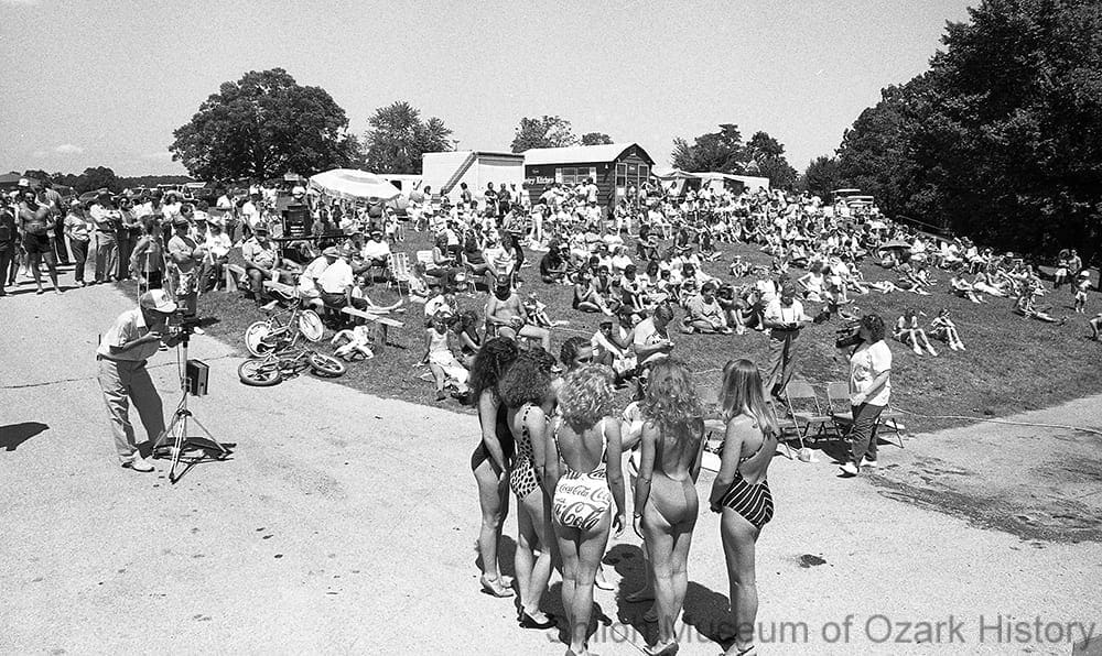 Miss Beaver Lake contestants stand before the cameras and the crowd, Horseshoe Bend, Rogers, Arkansas, August 29, 1987. 