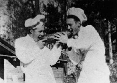 Two cooks clowning, Devil's Den CCC camp 1930s