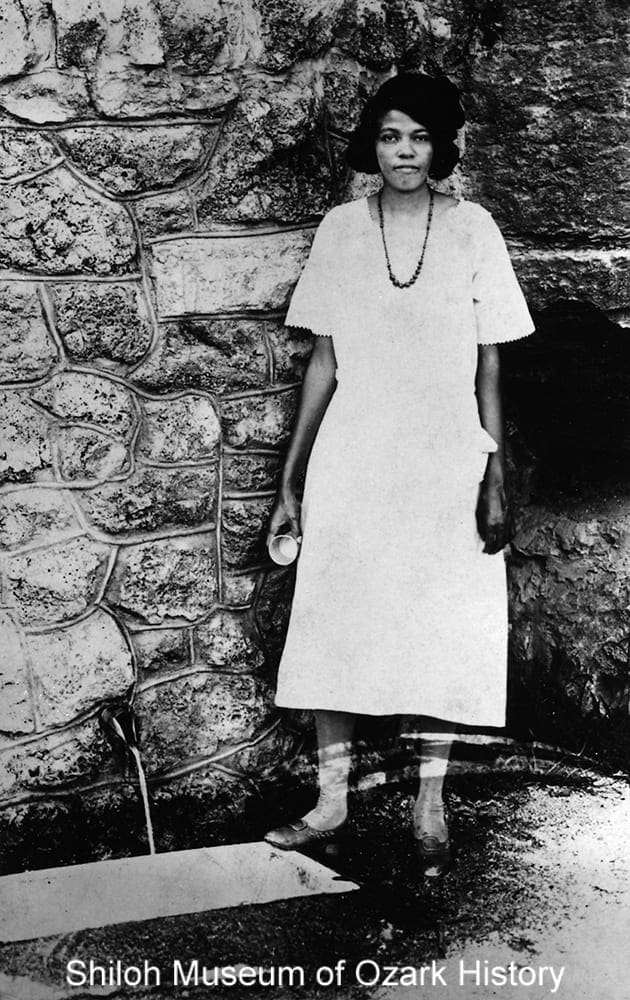 Mrs. O. W. Coleman at Harding Spring, Eureka Springs, Arkansas, 1920s.