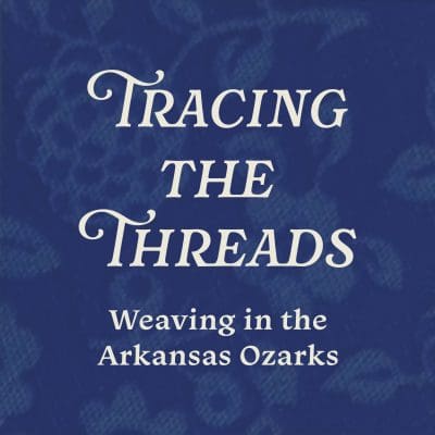 Graphic featuring a dark blue square with a subtle, monotone design with the words, "Tracing the Threads, Weaving in the Arkansas Ozarks."