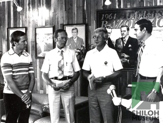 Lou Holtz, who passed away Wednesday, was a legendary college 🏈 football coach and sports analyst who lead Notre Dame to a 🏆 1988 national championship and served as the head coach at the University of Arkansas from 1977 to 1983. His popularity as a Razorback football coach was such, a souvenir doll in his likeness was manufactured (shown here). He held the unique distinction of guiding six different programs to bowl games.

An influential public speaker and author, Holtz's long career in the spotlight concluded with honors such as the Presidential Medal of Freedom and induction into the College Football Hall of Fame.

Shown here is Holtz, second from the right, in 1978. Also photographed are Charles McKinney (second from left) and two unidentified men.

Doll is from the Shiloh Museum’s Johnny George Collection; photo is from the museum’s Charles McKinney Collection (S-99-2-93).

#LouHoltz #ArkansasRazorback #WPS #UniversityofArkansas