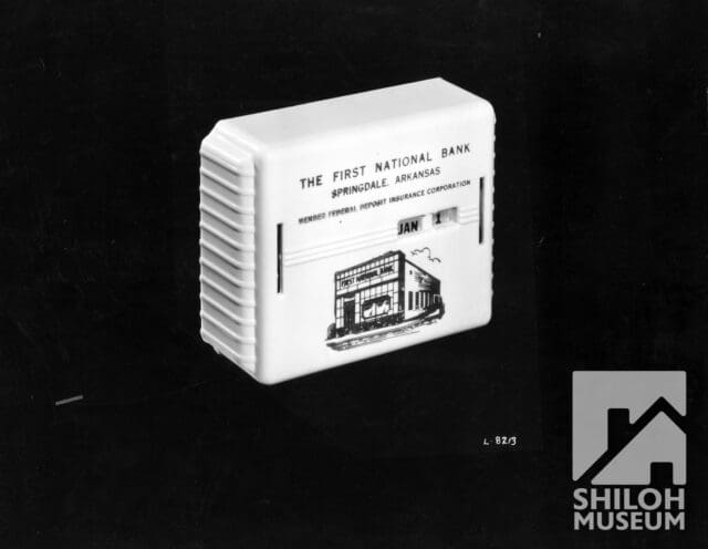 What on earth is this? 🤔

We don’t have the actual item in our collection—just this mystery photo from the First National Bank in Springdale!

Our best guess is a vintage desk stamp (with the rubber part at the bottom), but maybe it’s something else entirely? A coin bank with an attached calendar? A miniature time machine…? ⏳

Have you ever seen or used an item like this? Drop your best guesses in the comments below!

(If you share this to your feed or story, please make sure your post is public and tag us so we don't miss your insights!)

Have a great weekend, everyone!

#PhotoIDFriday #ShilohMuseum #SpringdaleArkansas #ArkansasOzarks