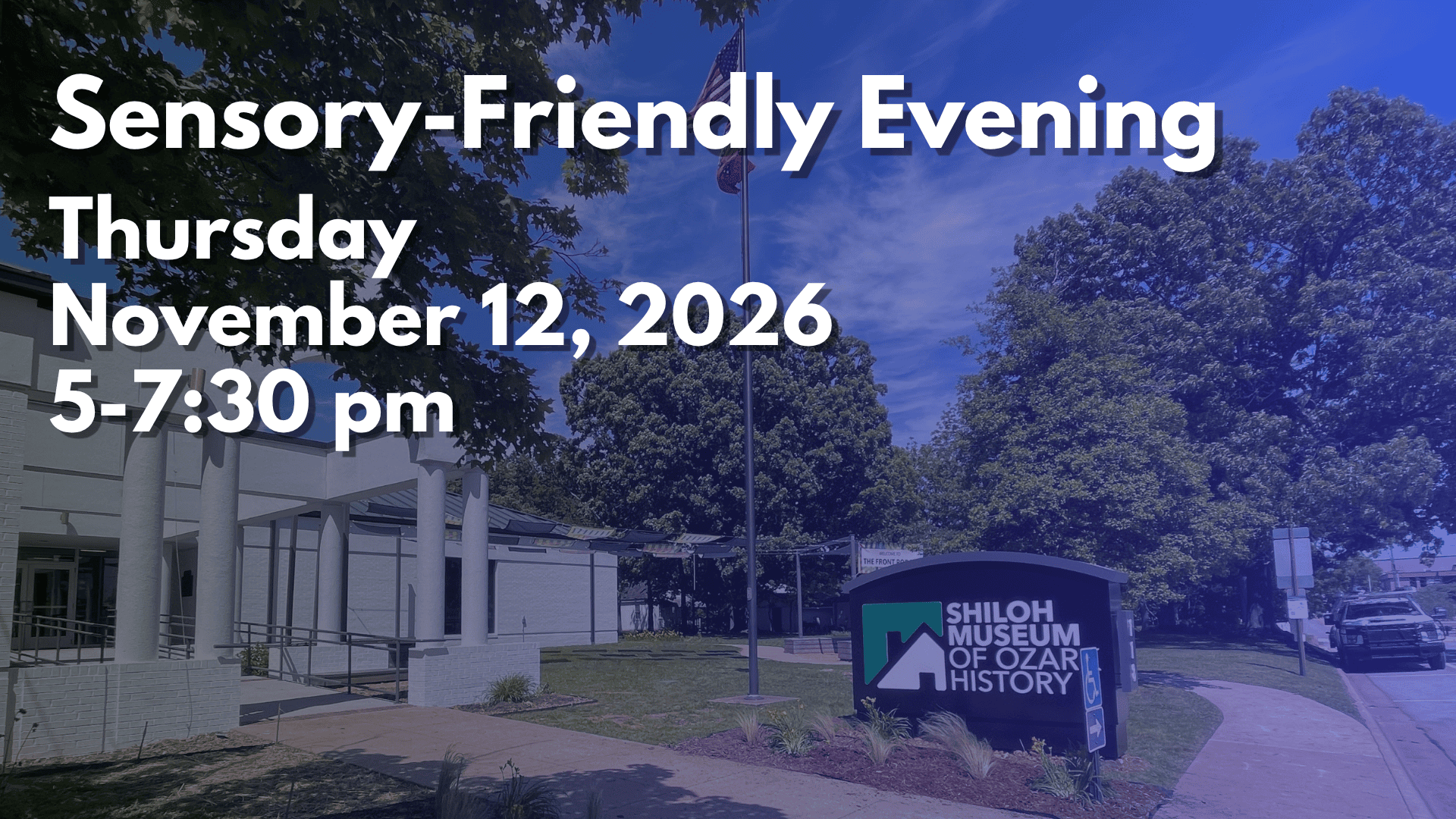 A darkened photograph of the front entrance of the Shiloh Museum of Ozark History with the words “Sensory-Friendly Evening, Thursday, November 12, 2026, 5-7:30 pm.”